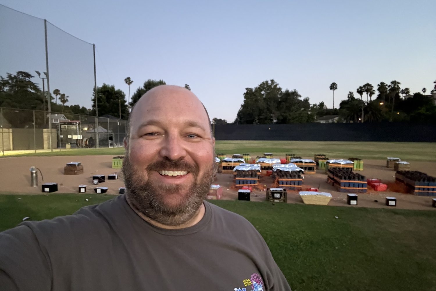 Stephen M. Yoss, Jr. setting up a Fourth of July fireworks show