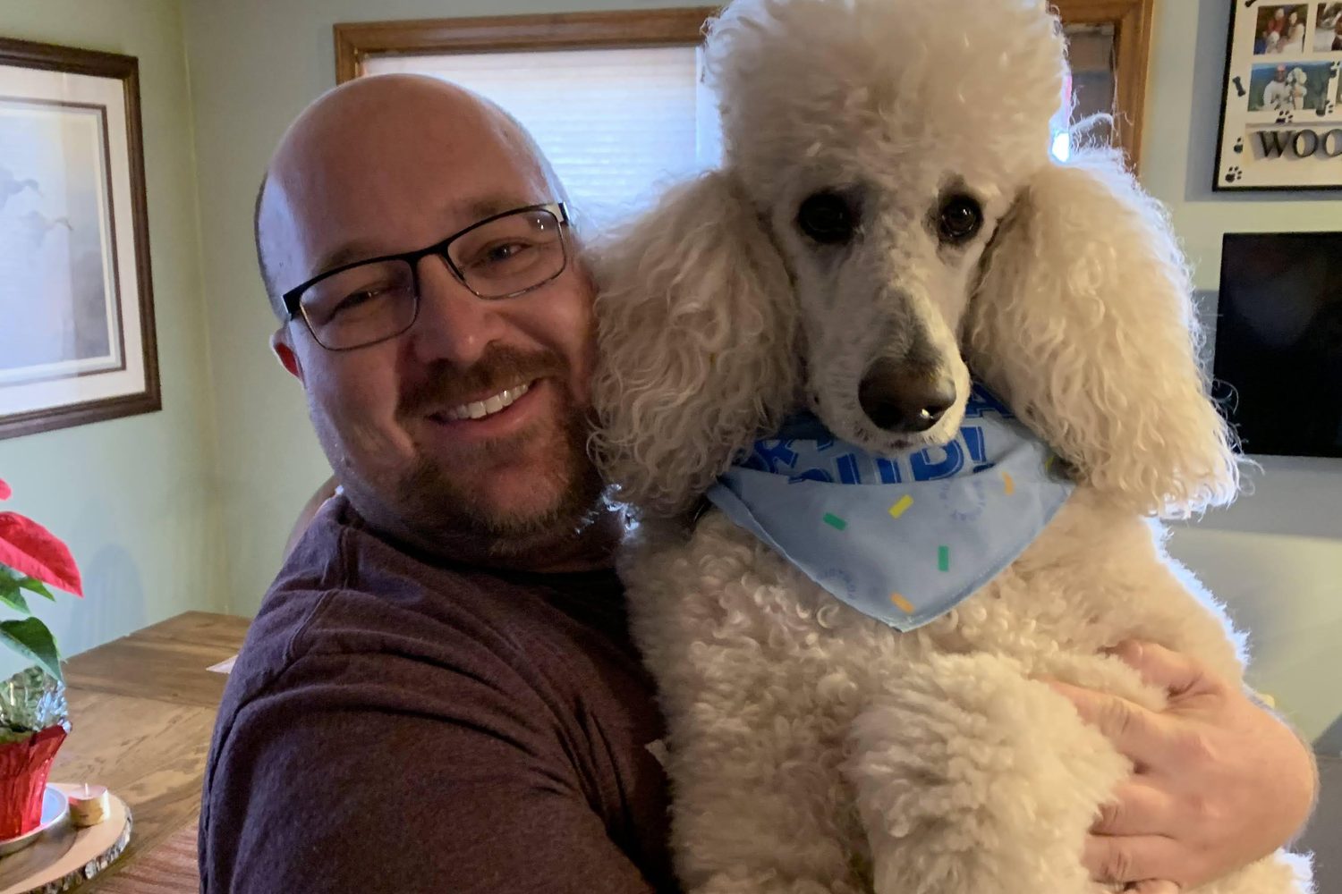 Stephen M. Yoss, Jr. with Winston the poodle